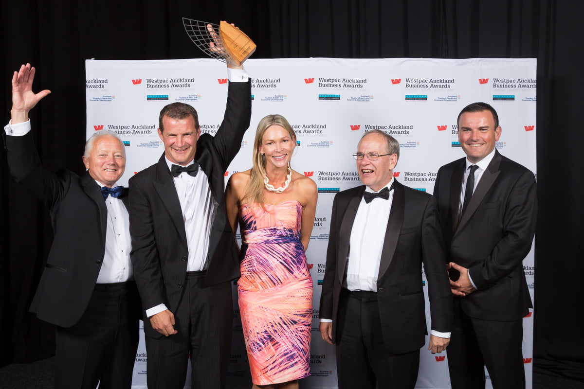 People celebrating the victory of an award