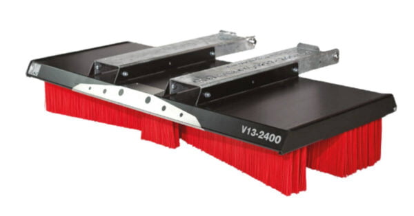 Detail of red and black actisweep yard sweeper push broom