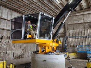 A person operating a Horizon Denis B Fan recycling machine