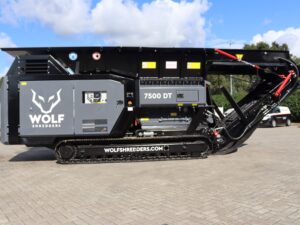 Side Landscape View Of a WOLF 7500 DT Shredder In Black and Grey